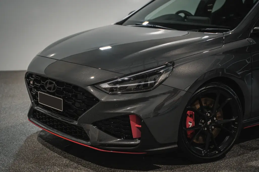 Grey Hyundai i30 N front end after a paint correction and ceramic coating detail