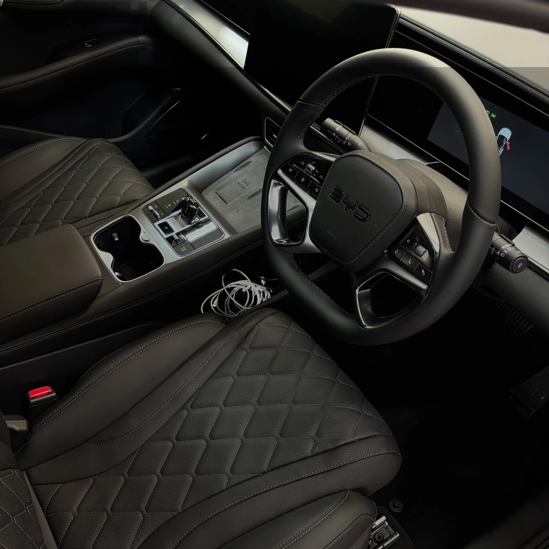 Detailed leather interior and dashboard of a BYD after pre sale detailing