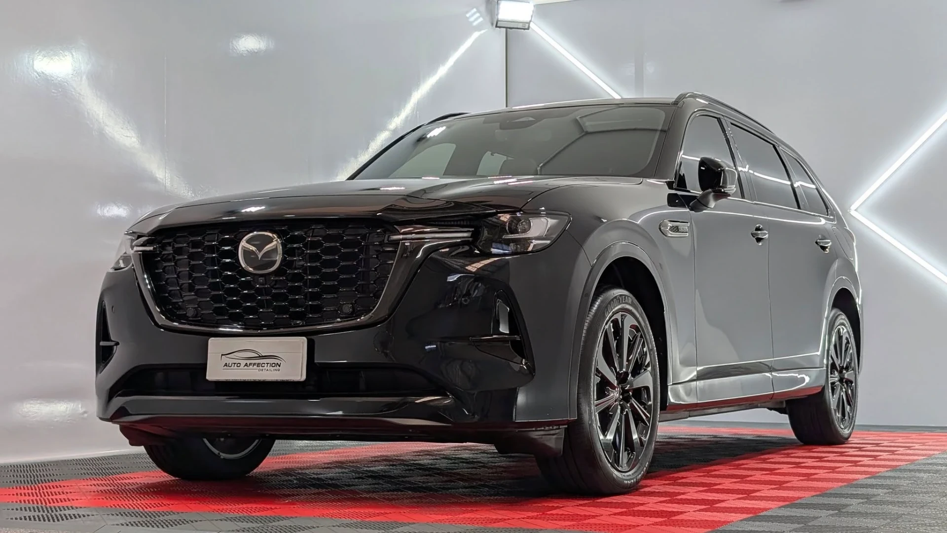 Black Mazda CX-90 detailed and coated in the Auto Affection Detailing showroom